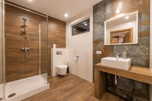 Kúpeľňa v ubytovaní Villa Gromadzyń