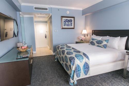 Säng eller sängar i ett rum på The Jamaica Pegasus Hotel