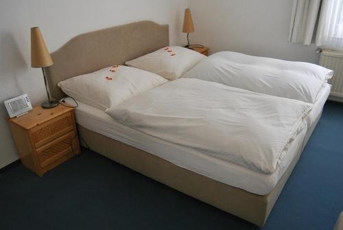 Postel nebo postele na pokoji v ubytování Paciello Restaurant Hotel