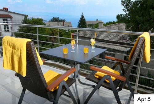 Un balcón o terraza de Villa Dragi with Pool, Sauna, & Whirlpool