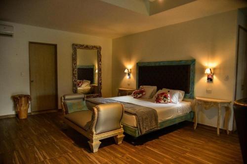 Uma cama ou camas num quarto em Hotel Finca Naranjal