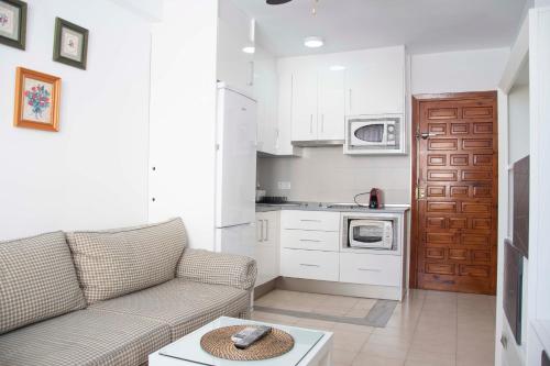 A cozinha ou cozinha compacta de MONKÓ - ROSARIO APARTMENT BEACH & SUN o