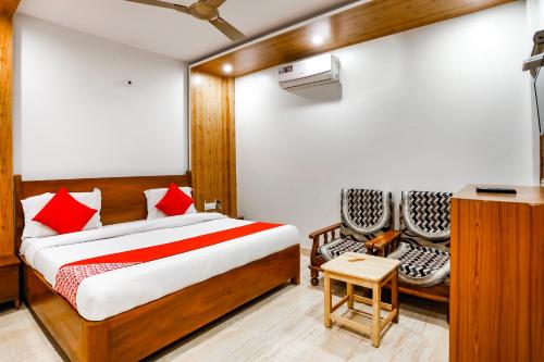 En eller flere senge i et værelse på Sagar Niwas