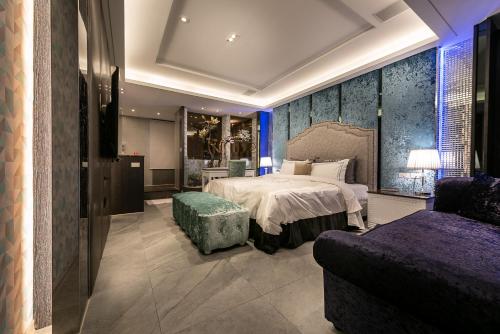 Llit o llits en una habitació de Shuiyue Boutique Motel