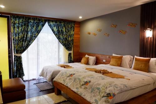 Cama o camas de una habitación en The Park Ayutthaya Resort And Spa