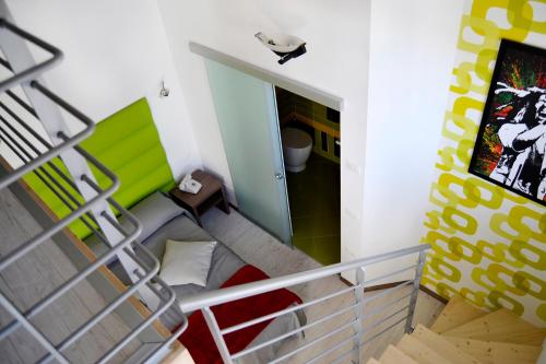 an overhead view of a staircase in a room at B&B Seventy Design in Dimaro