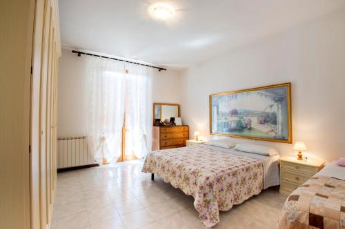 Postel nebo postele na pokoji v ubytování B&B VILLA GINEVRA