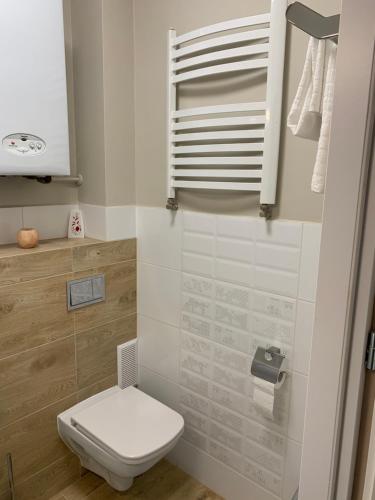 Kúpeľňa v ubytovaní Apartament „Ogrodowa”