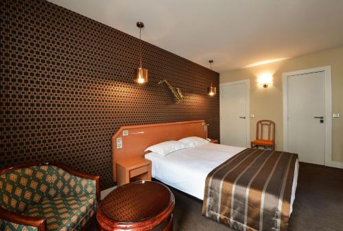 Кровать или кровати в номере Relais du Pré