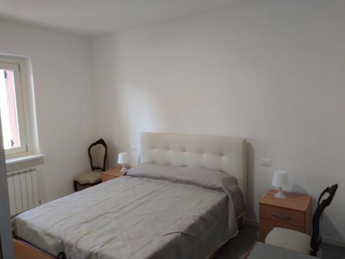 Ένα ή περισσότερα κρεβάτια σε δωμάτιο στο Costantino home