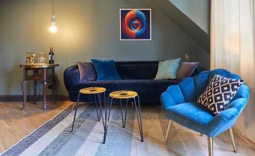 Coin salon dans l'établissement Cora Apartments