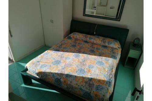 リニャーノ・サッビアドーロにあるResidenza Rubinのベッド(布団付)が備わる客室です。