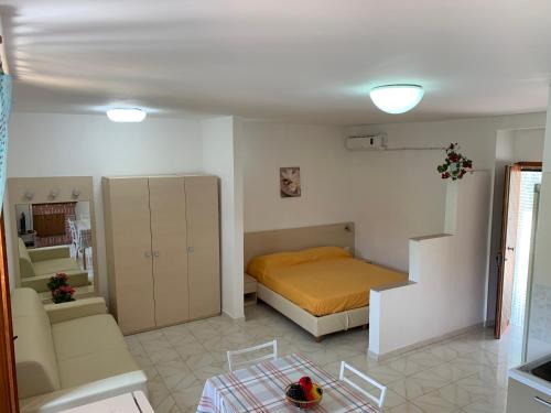 מיטה או מיטות בחדר ב-Casa del gelso