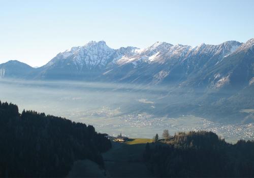 a view of a valley with mountains in the background at Alpenrelax Krepperhütte in Volders