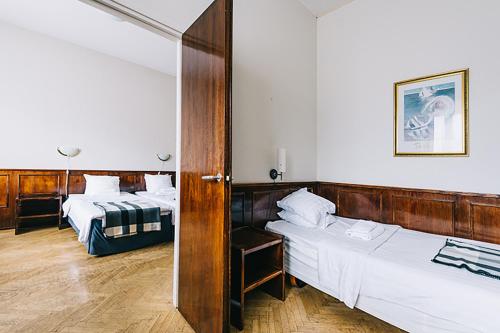 Posteľ alebo postele v izbe v ubytovaní Comfort Guesthouse