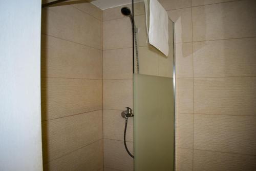 a bathroom with a shower with a shower head at Nice Studio in Siesta 2 in Puerto Alcudia 6 in Alcudia
