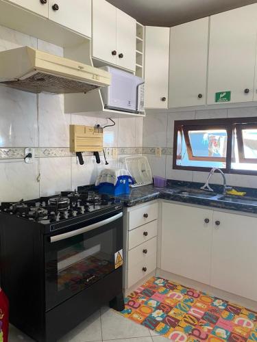 Dapur atau dapur kecil di CONDOMINIO MIRALVA