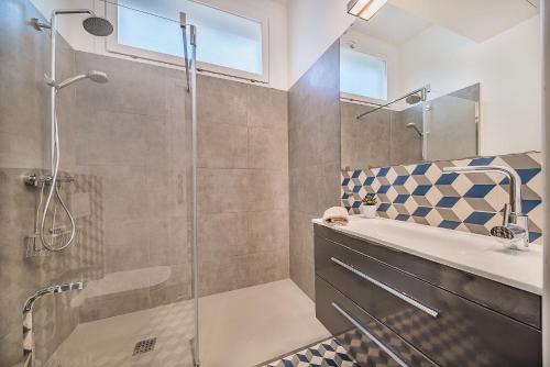 A bathroom at Beachfront Villa Es Clot by Sealand Villas