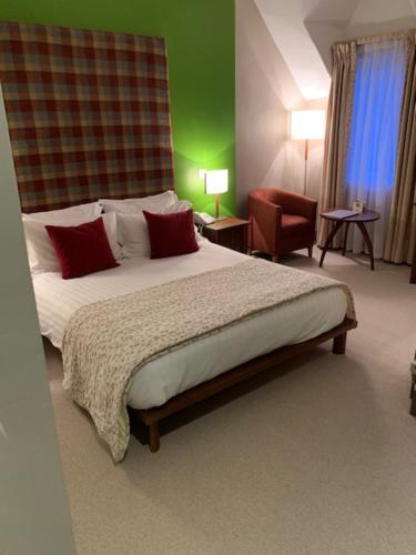 Postel nebo postele na pokoji v ubytování Forest Hotel