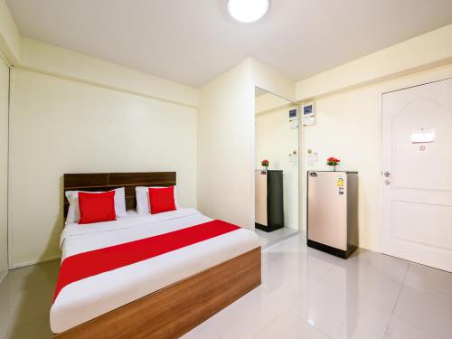 Ένα ή περισσότερα κρεβάτια σε δωμάτιο στο Salin Home Hotel Ramkhamhaeng
