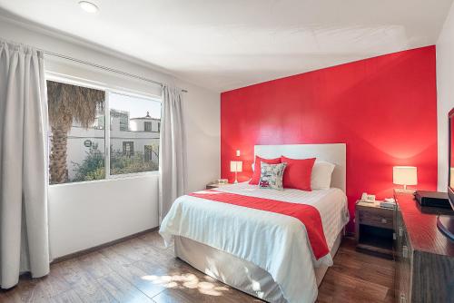 Postel nebo postele na pokoji v ubytování Suites Copérnico Polanco Anzures