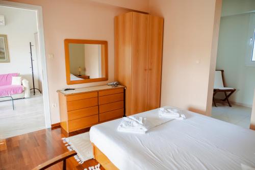 Postel nebo postele na pokoji v ubytování Seafront Apartment