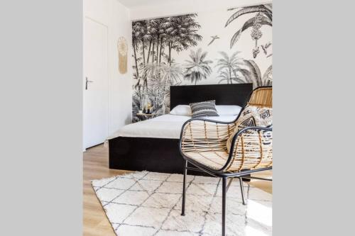 Ένα ή περισσότερα κρεβάτια σε δωμάτιο στο Studio tendance, 2min de l'hyper-centre