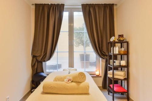 Abasto Hotel & Spa Maisachにあるベッド