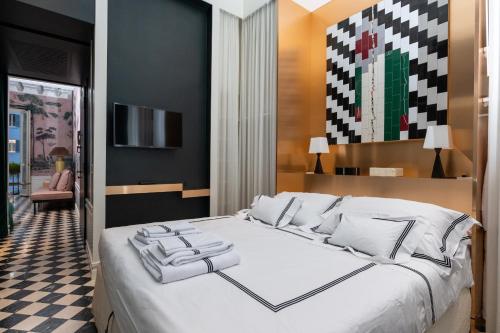 Ліжко або ліжка в номері Pantheon Balcony Morgana Suite
