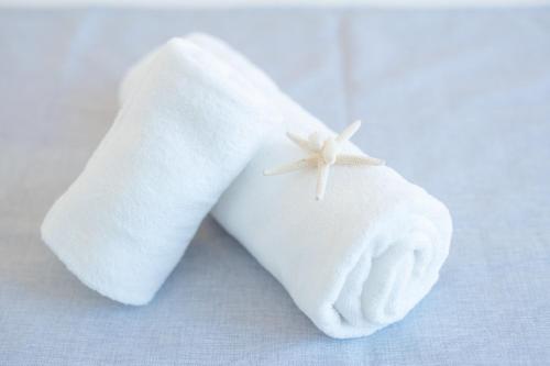 a pair of white socks with a bow on them at Vento di mare in Procida