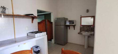 Kuchyňa alebo kuchynka v ubytovaní Hotel Iker
