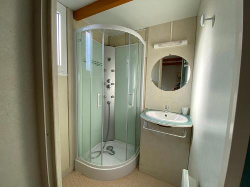 a bathroom with a shower and a sink at Camping Berceo in Berceo