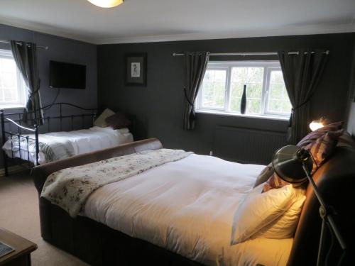 Cama o camas de una habitación en The Swan Inn
