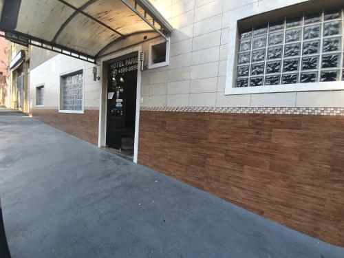 a building with a entrance to a building at Hotel Paris in Jundiaí