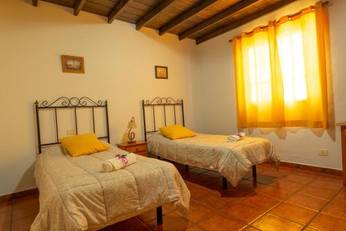 A bed or beds in a room at Casa Carolina 2