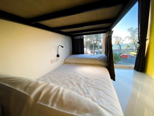 Gulta vai gultas numurā naktsmītnē Fishtail Hostel Phuket