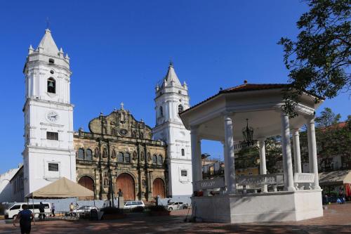 a large white building with two towers and a church at Holiday Inn Panama Distrito Financiero by IHG in Panama City