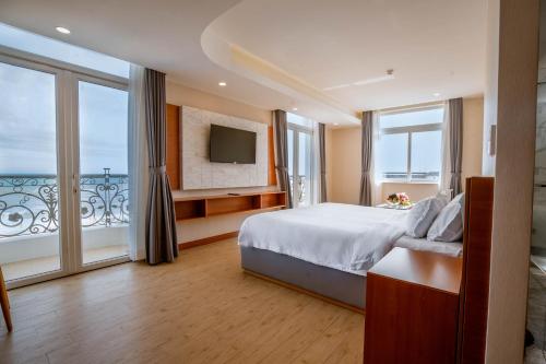 Postel nebo postele na pokoji v ubytování Bella Vita Hotel