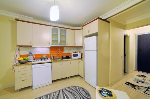 A kitchen or kitchenette at Apart Point