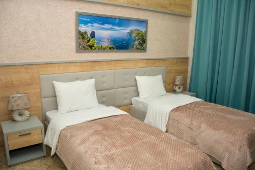 Katil atau katil-katil dalam bilik di AZPETROL HOTEL KURDEMIR