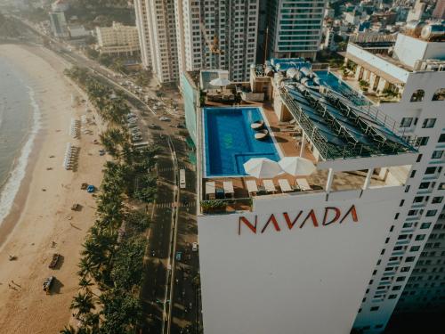 an aerial view of a beach and a cruise ship at Navada Beach Hotel in Nha Trang