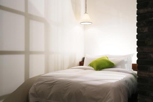Una cama o camas en una habitación de Boutique Hotel Loft