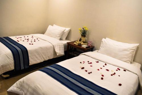 Ένα ή περισσότερα κρεβάτια σε δωμάτιο στο Hotel Lourdes