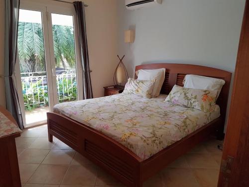 Ein Bett oder Betten in einem Zimmer der Unterkunft Villa Turquoise