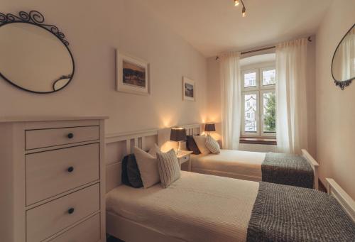 Posteľ alebo postele v izbe v ubytovaní Apartament Rynek - Zielona Kamienica