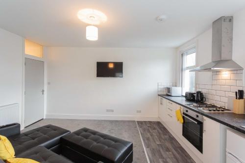 Η κουζίνα ή μικρή κουζίνα στο Cherry Property - Hornby Road