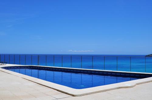 The swimming pool at or close to VILLA AUREA-Cala Mesquida- Primera linea de Mar
