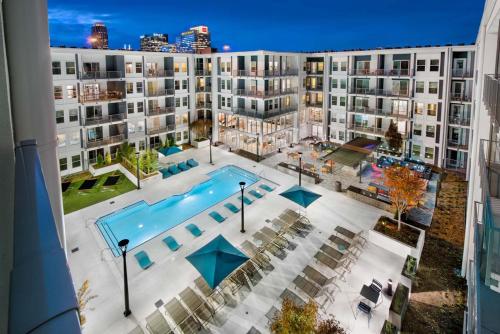an aerial view of a large apartment building with a pool at Spectacular Apartments by BCA Furnished Apartments in Atlanta