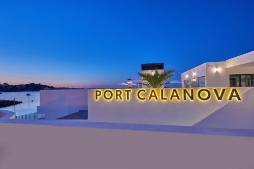 a sign that readsport calamineva on a building at Calanova Sports Residence in Palma de Mallorca