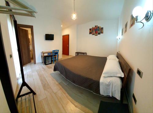 Postel nebo postele na pokoji v ubytování il Giglio dei Sassi